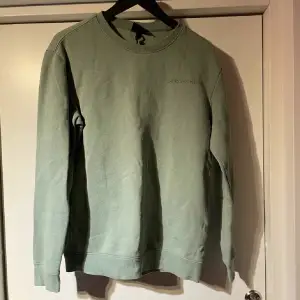 En grön Sweetshirt från H&M, stl xs - 50kr 