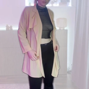 Nude spring coat - Flowy cute beige coat, has a tieband at back, good condition. Suitable for spring/summer weather