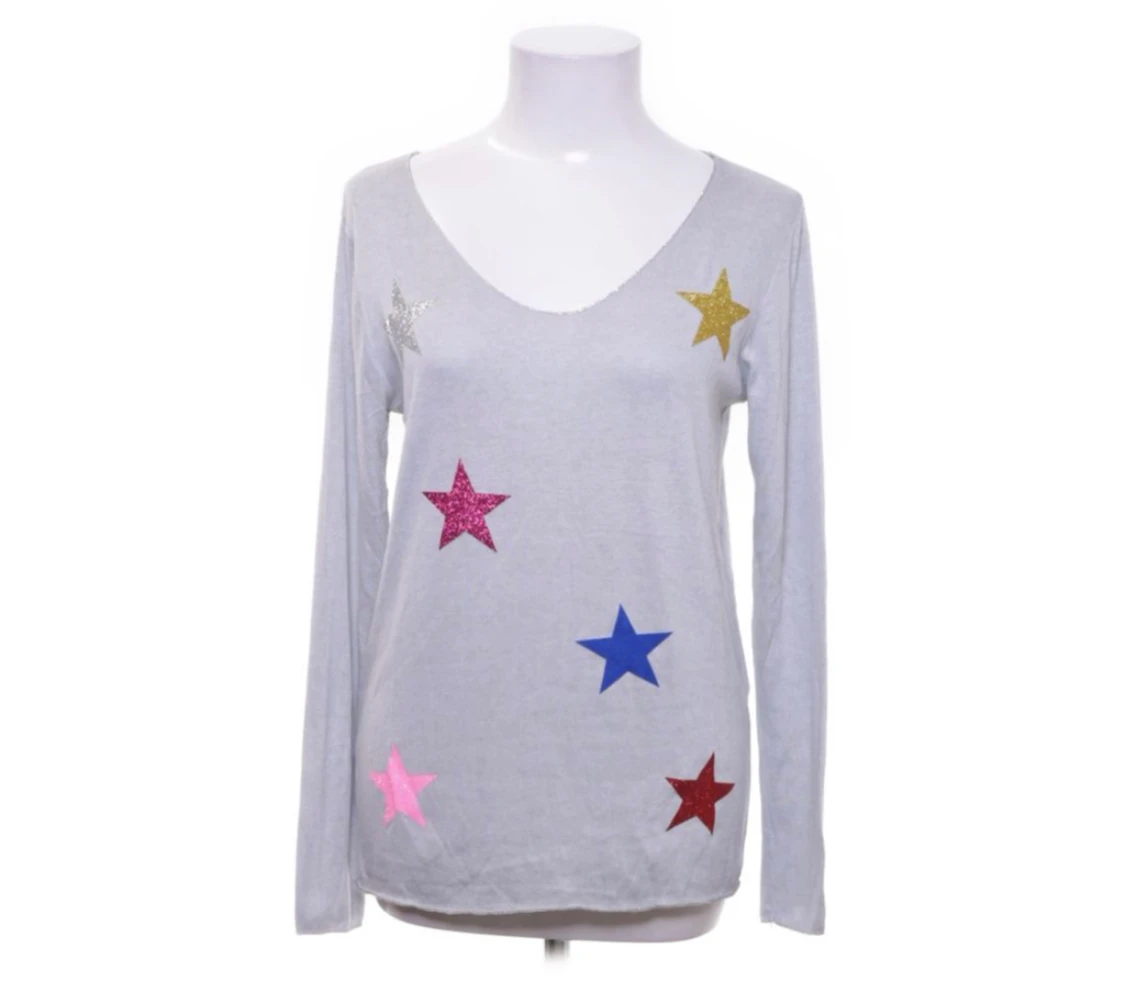 Tunn tröja med fina glittriga stjärnor på