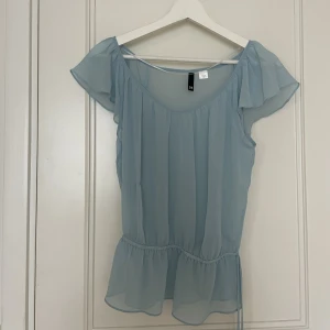 Blus - Blå blus från H&m i storlek 34