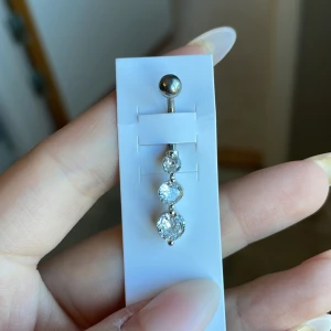 piercing  - Navel piercing i kirurgisk stål aldrig använd nypris 199:-