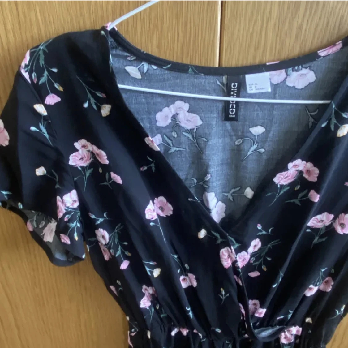 Blommig byxdress - 91