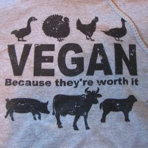 Ny hoodie med svart text/djur: VEGAN because they're worth it. Passar XS/S