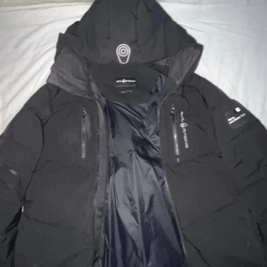 Svart pufferjacka från Sail Racing