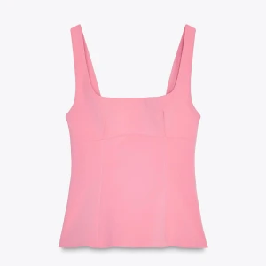 Rosa topp Zara  - Rosa topp från Zara med rosett i ryggen, aldrig använd med prislappen på! Stl M💕skriv för fler bilder! Den är liten i storlek☺️