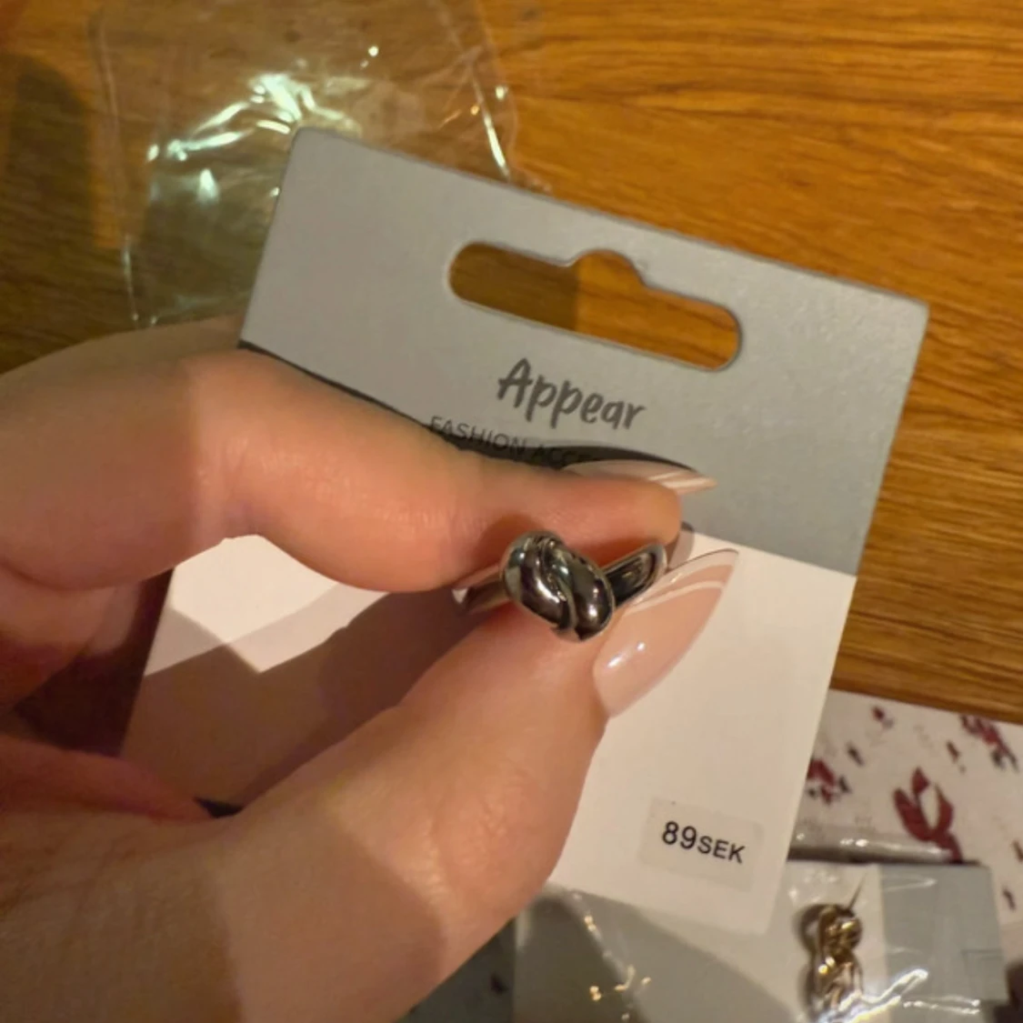 Silverfärgad ring med knut från Appear - 1