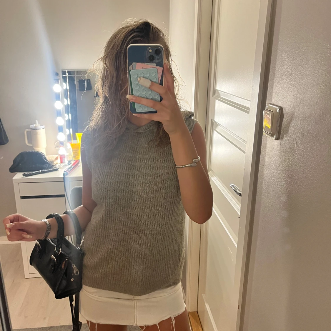 Stickad ärmlös hoodie i ljus grön - 1