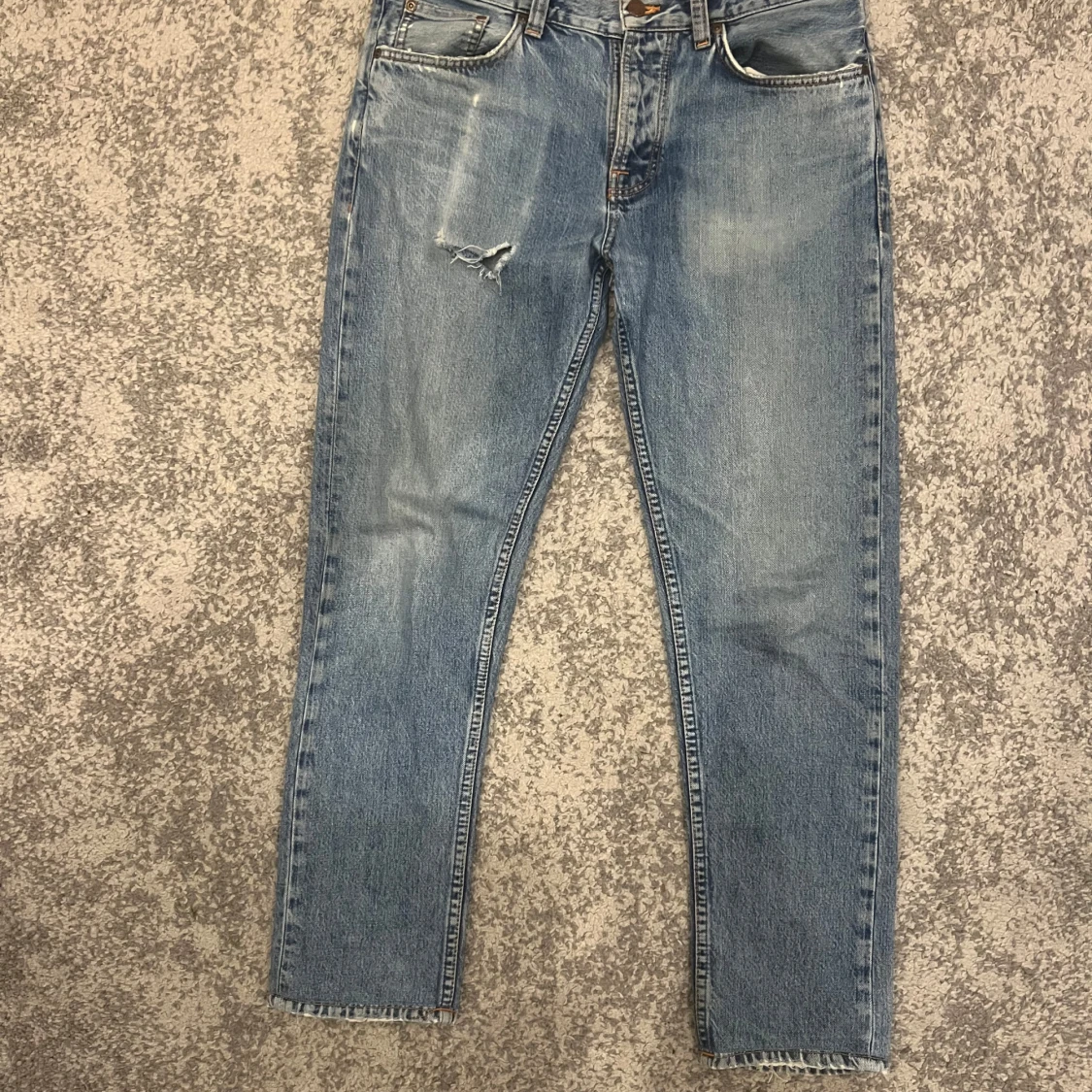 Nudie Jeans blå slitna jeans 31/32