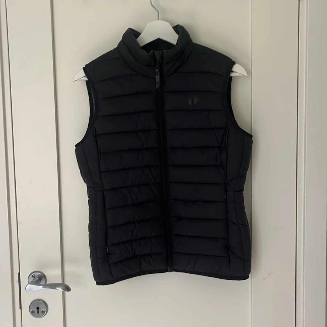 Svart dunväst från Hang Ten, stl S