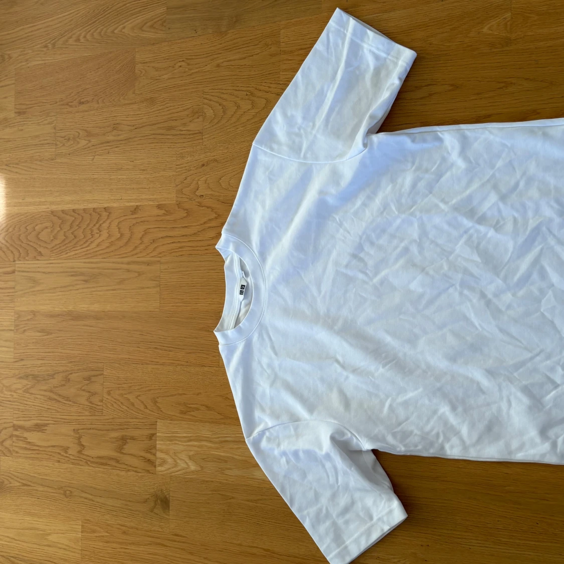 Vit t-shirt från Uniqlo U strl S