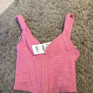 Rosa korsett-topp från Zara  - Med prislapp på. Storlek S