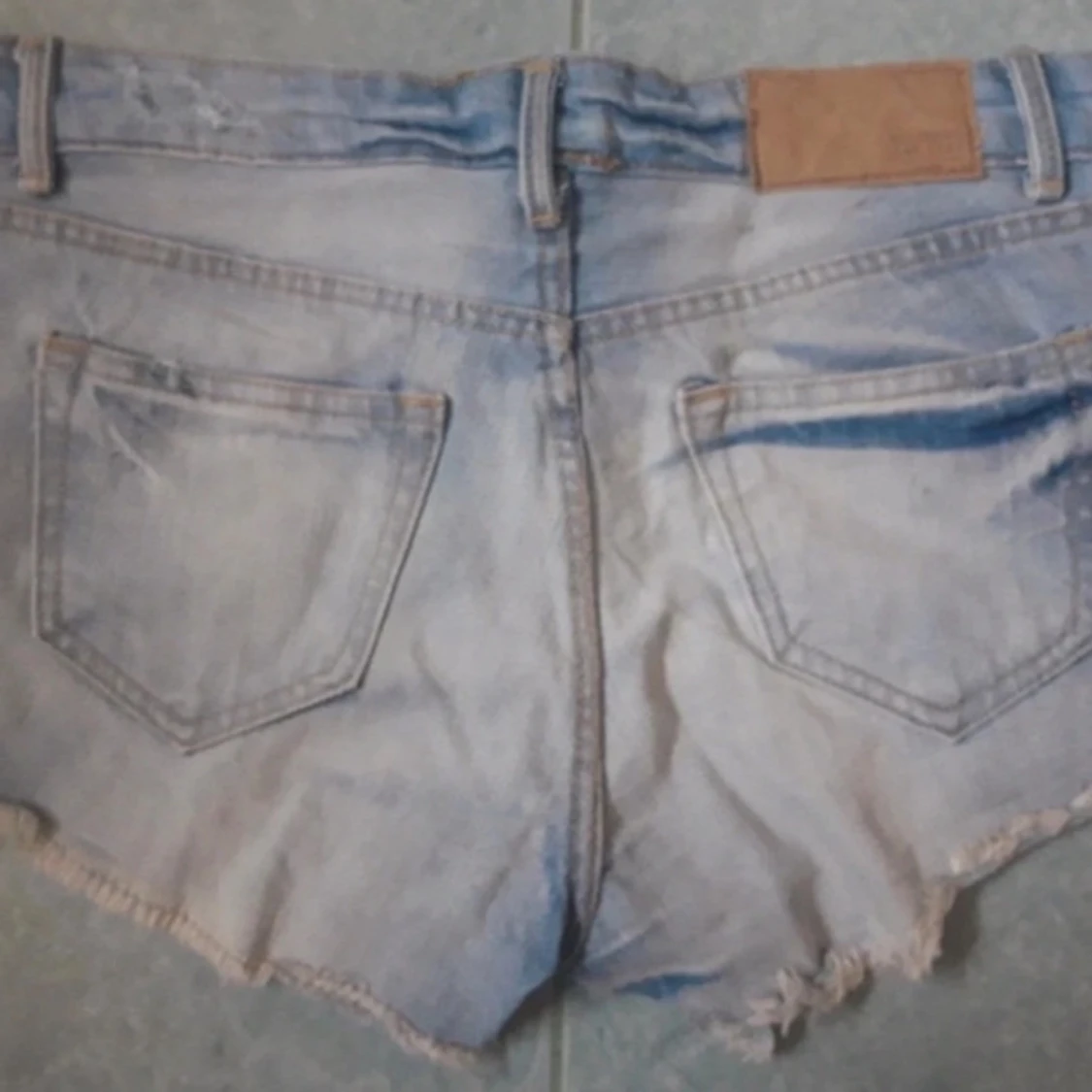 Lågmidjade jeansshorts - 1