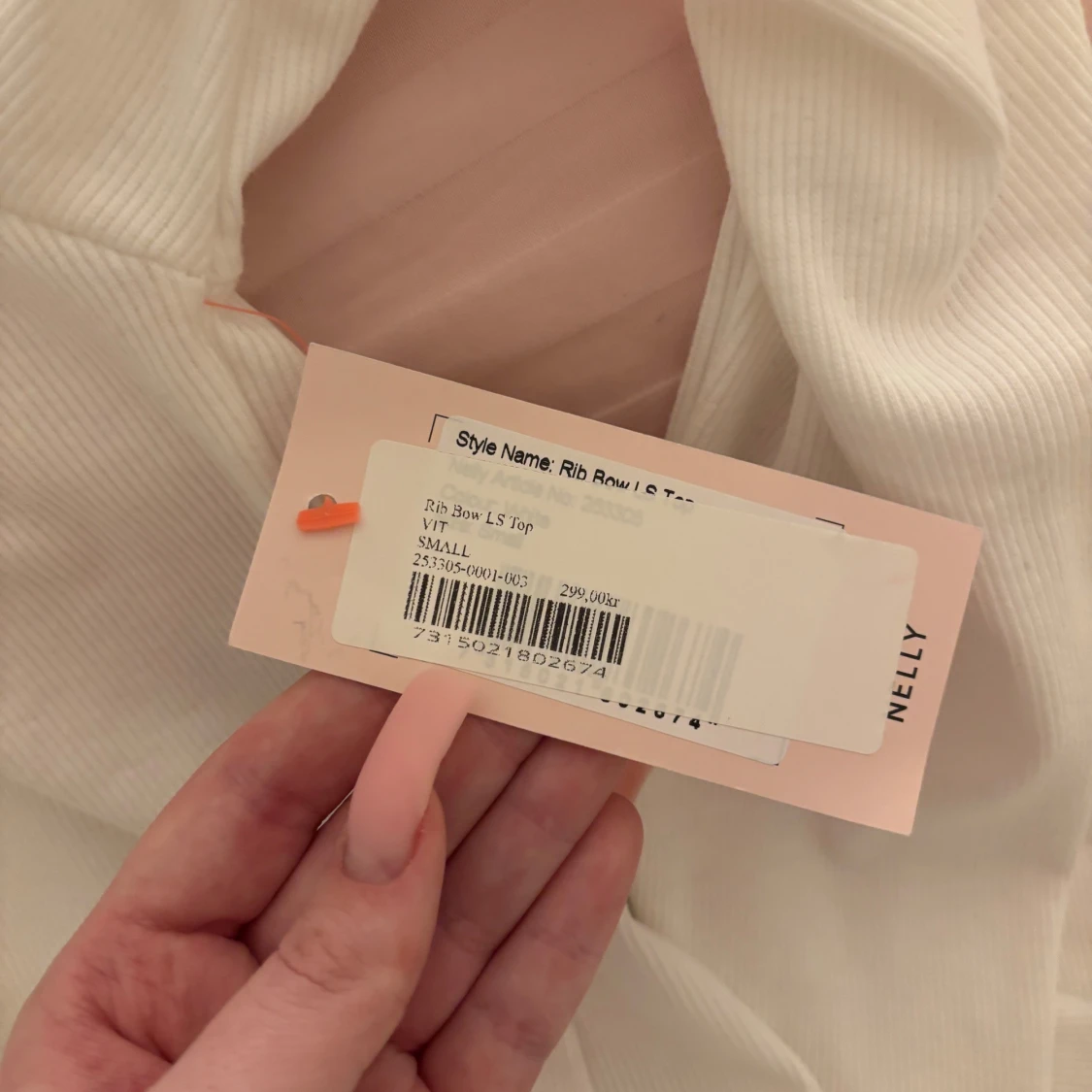 Tröja med rosetter från Nelly - 2