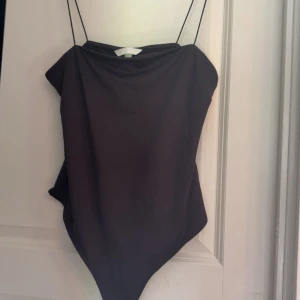 Body från hm - Body från hm storlek m aldrig använd prislapp kvar 