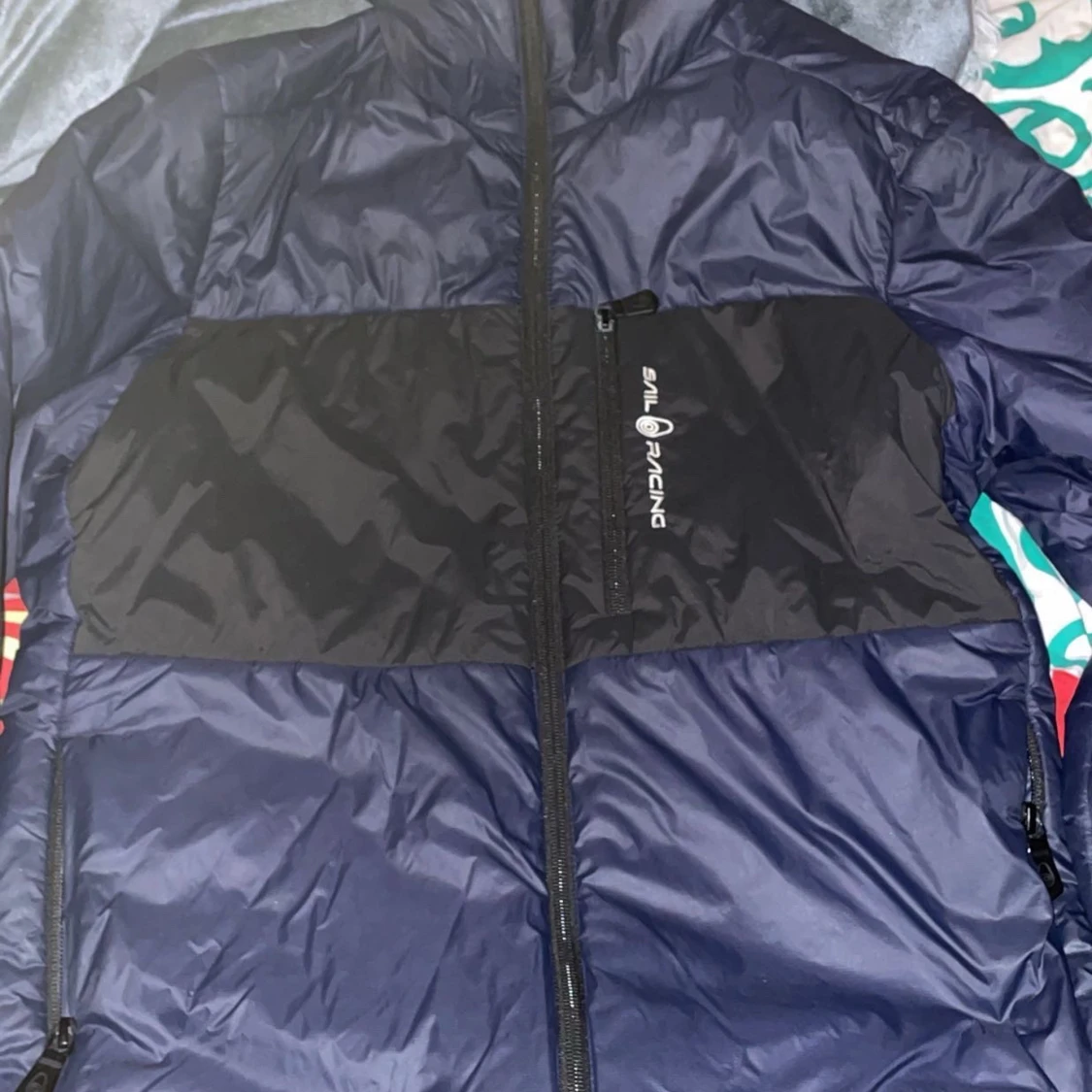 Blå och svart Sail Racing pufferjacka
