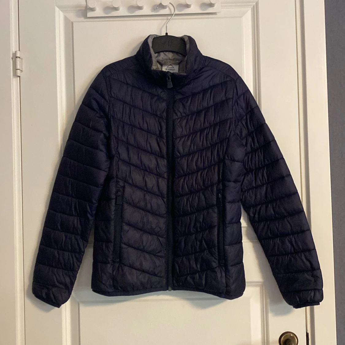 Mörkblå dunjacka från McKinley