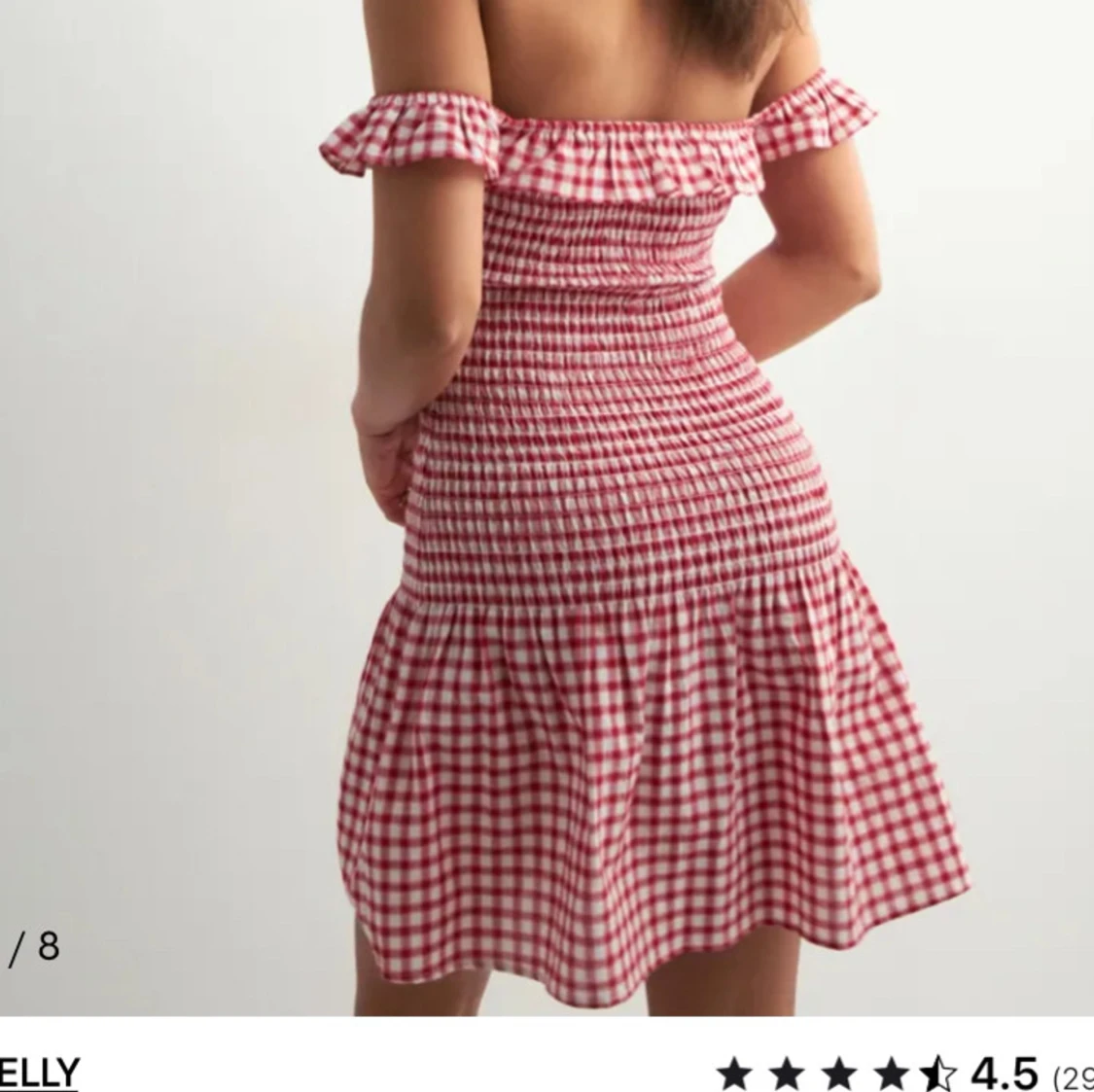 Rutig rödvit kortklänning med volang - 1