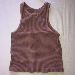 Rosa workout topp - Säljer en snygg rosa workout top. 