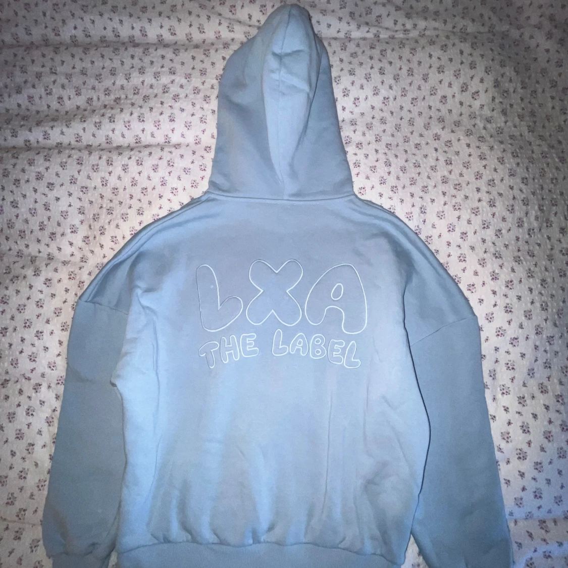 Ljusblå hoodie från LXA the Label