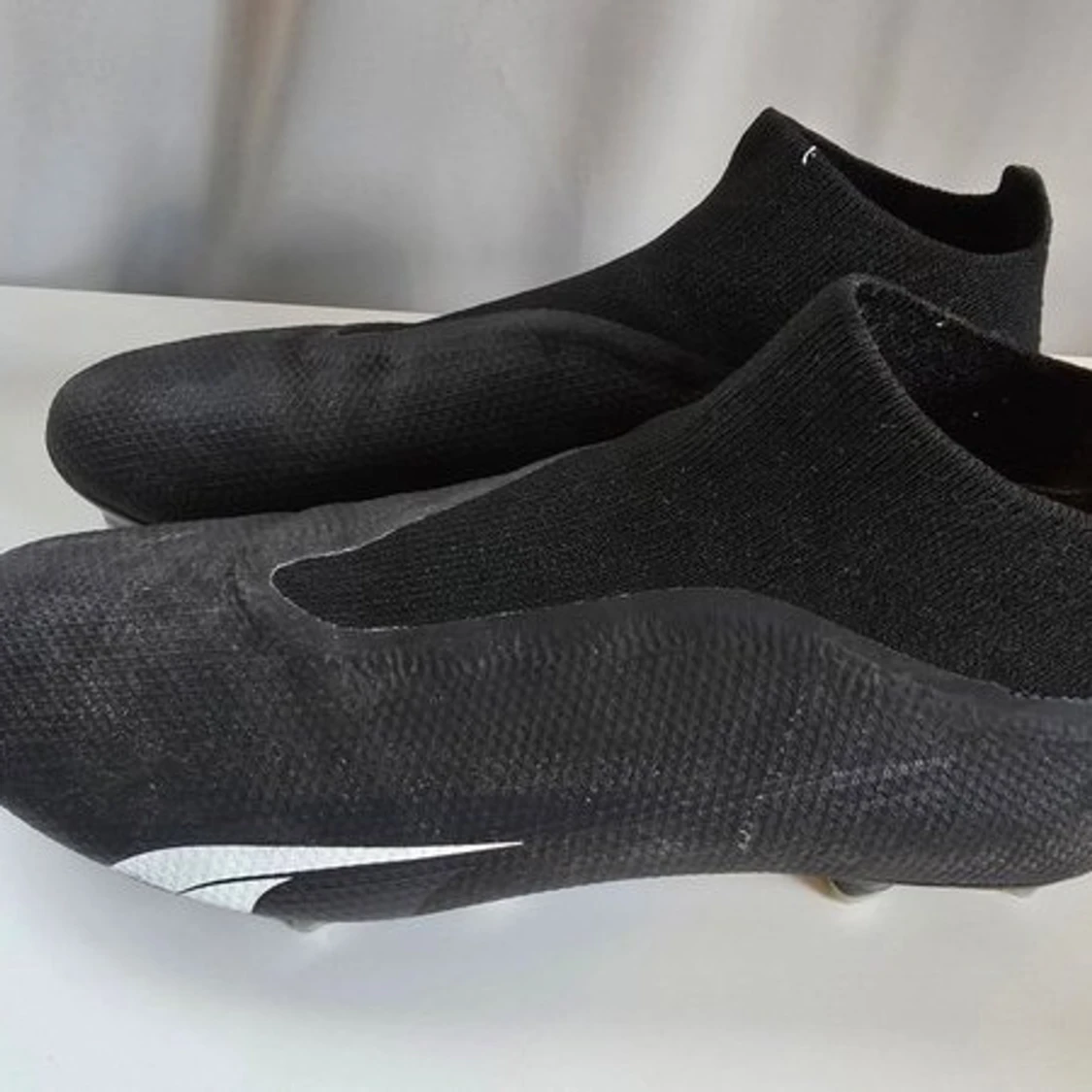 Svarta Puma Ultra fotbollsskor