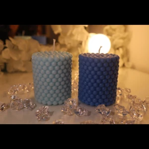 Blueberry Bubble Pillar Candles  - Blueberry Bubble Pillar Candles With a glossy bubble texture and soothing tones of baby blue and navy, these candles add a modern twist to any space. Fun to touch, calming to look at-perfect for stylish shelves or gifts.
