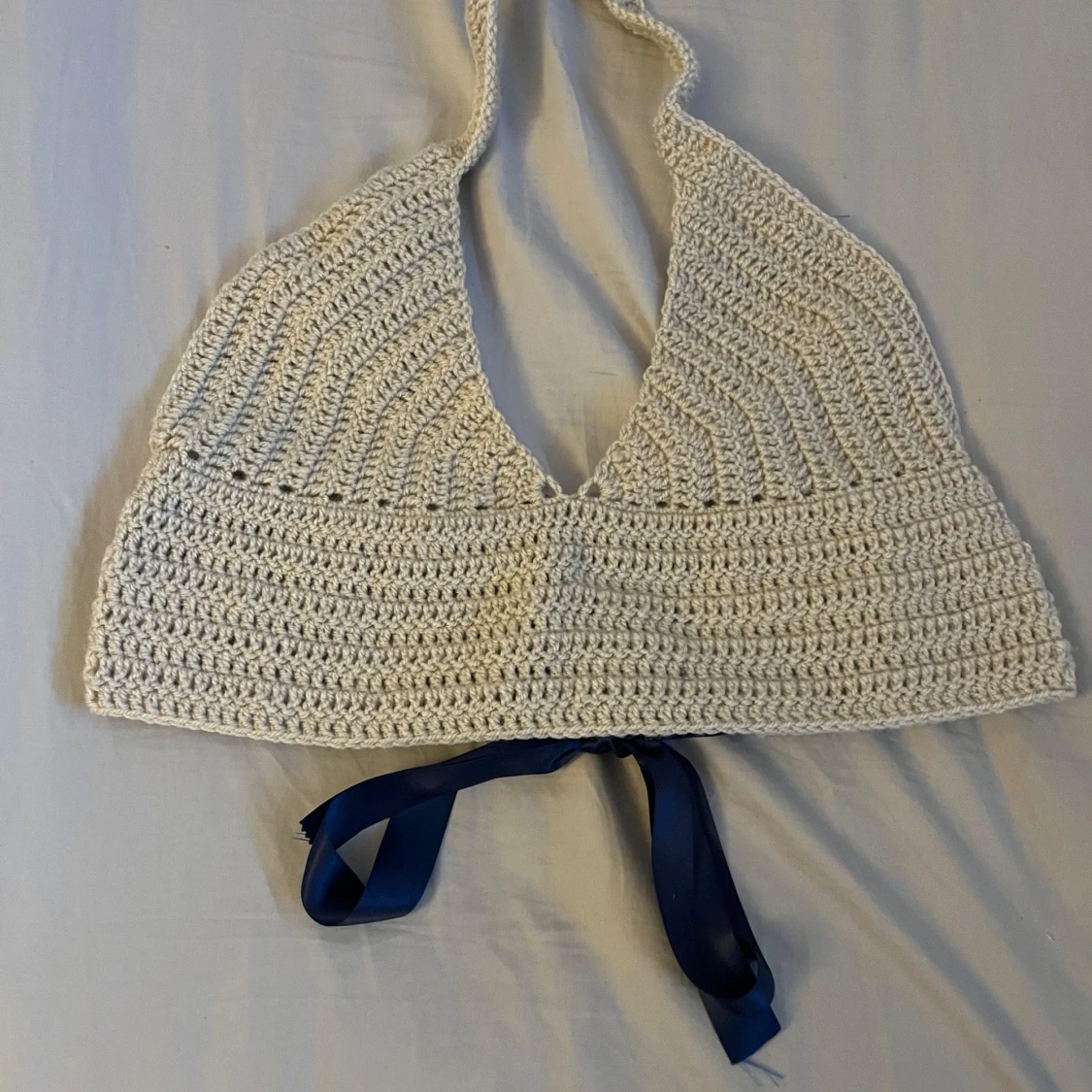 Virkad topp med snörning