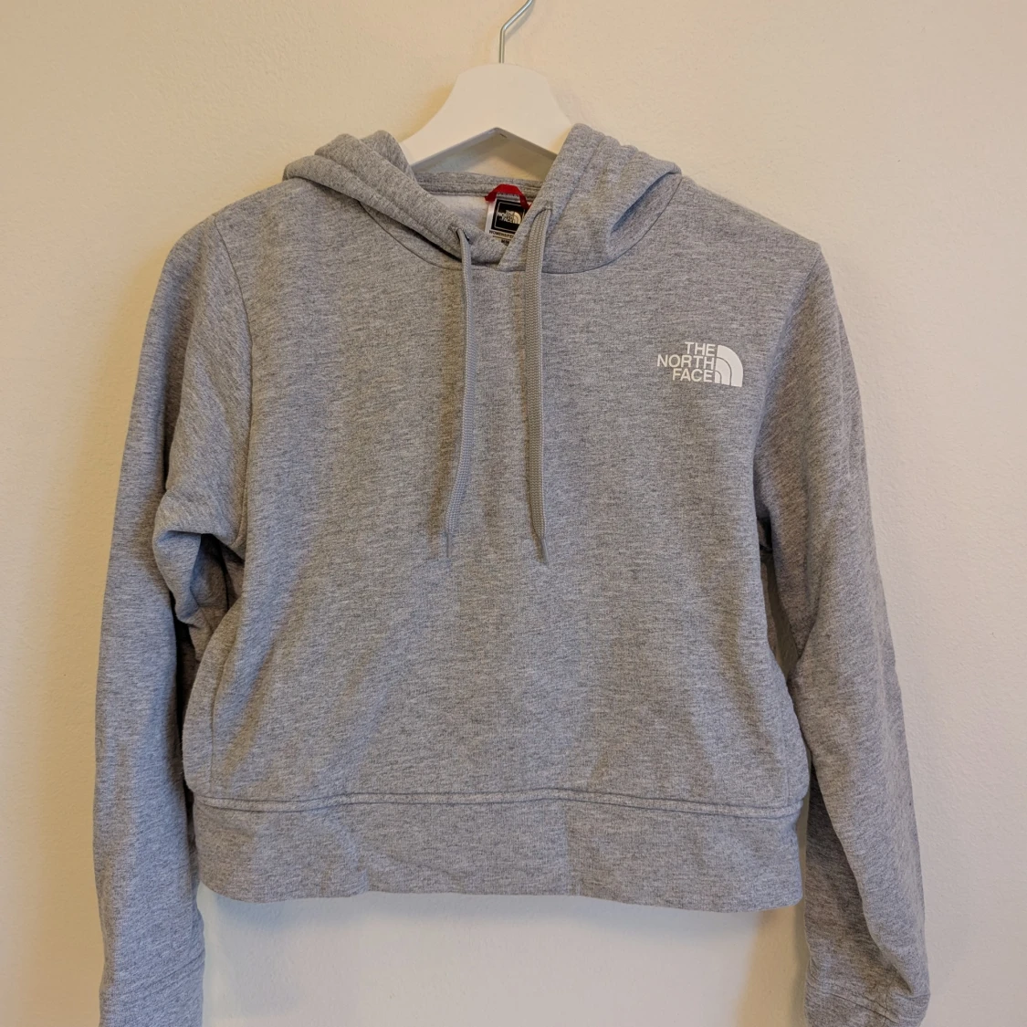 The North Face - Cropped grå hoodie