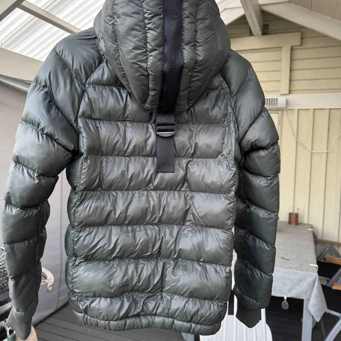 Svart dunjacka Peak Performance XS - 1