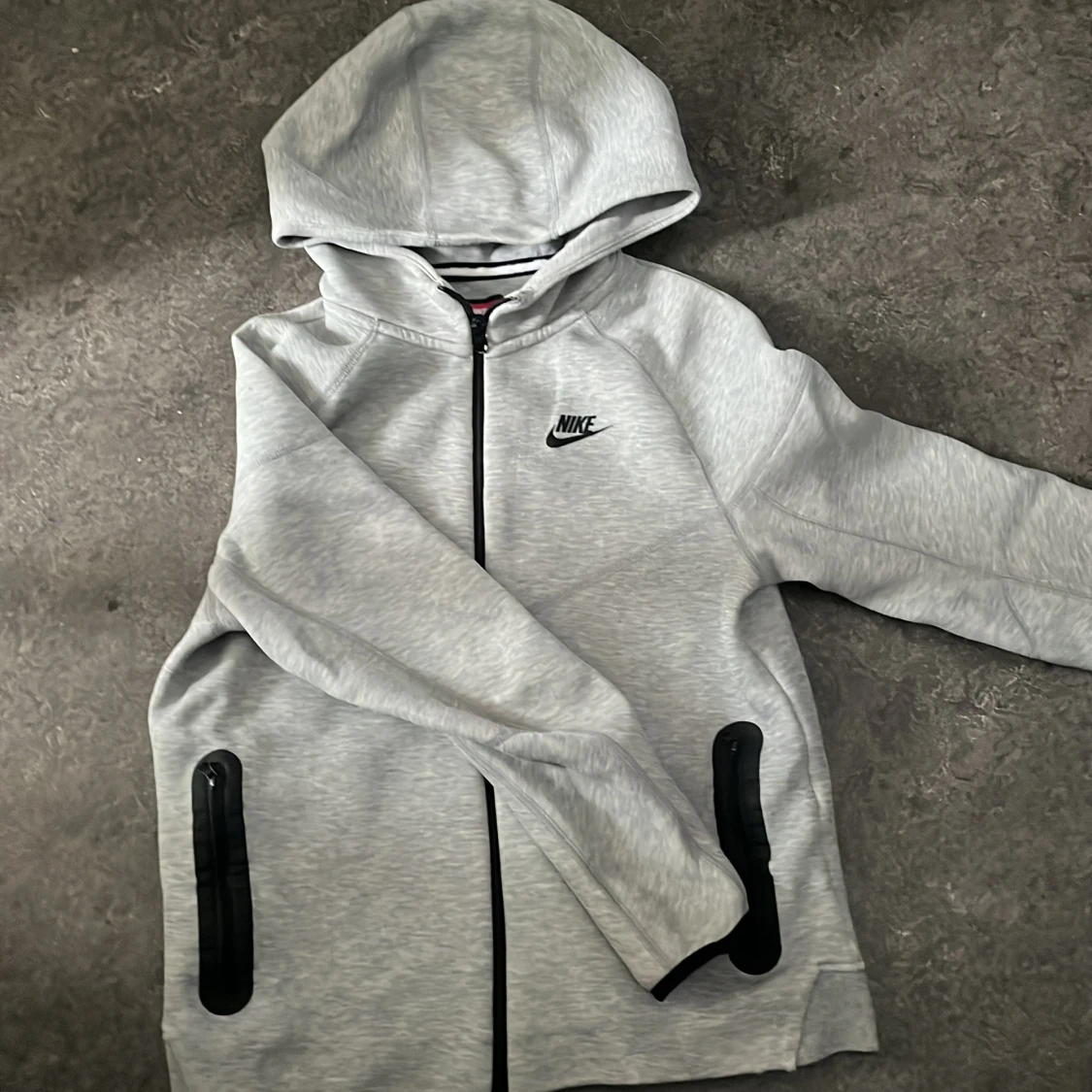 Grå tracksuit från Nike