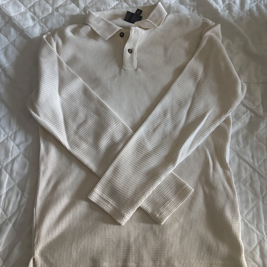 Vit pikétröja i slim fit från H&M