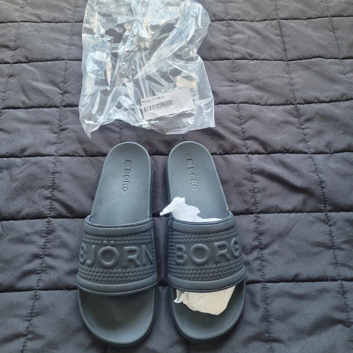 Mörkgrå slides från Björn Borg