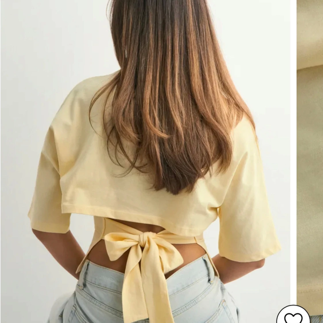 Intresskoll på en gul knyt topp från Nelly