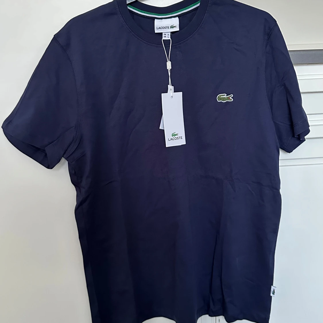 Mörkblå t-shirt från Lacoste - 1