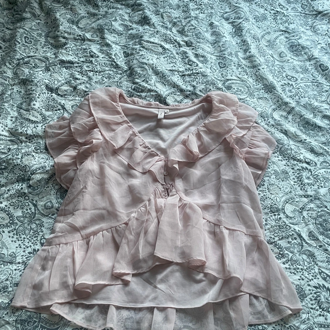 Ljusrosa volangblus från Nelly - 2