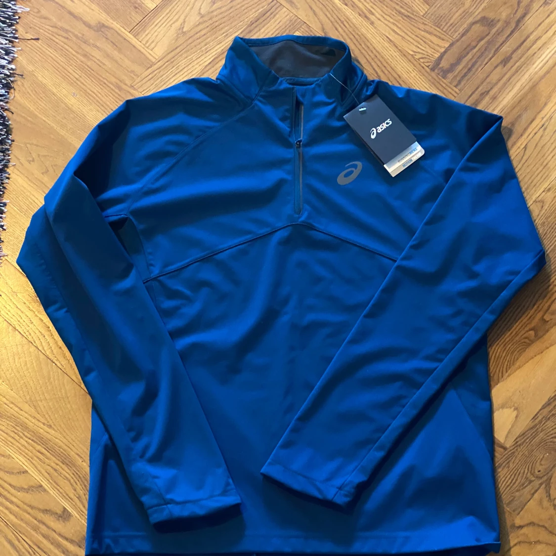 Blå träningshoodie från Asics M