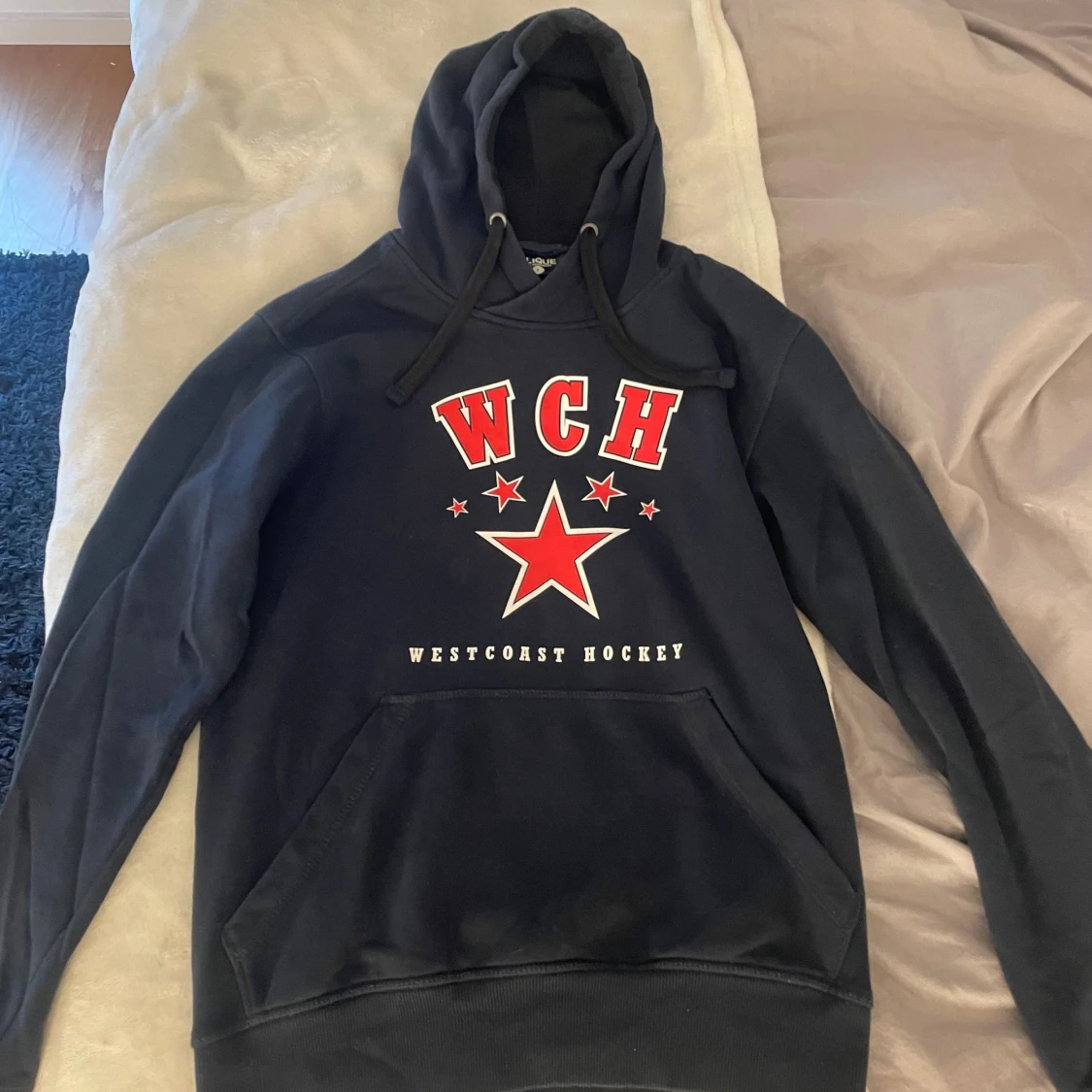 Svart hoodie WCH Westcoast Hockey