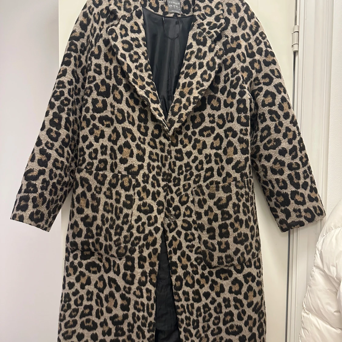 Leopardmönstrad kappa