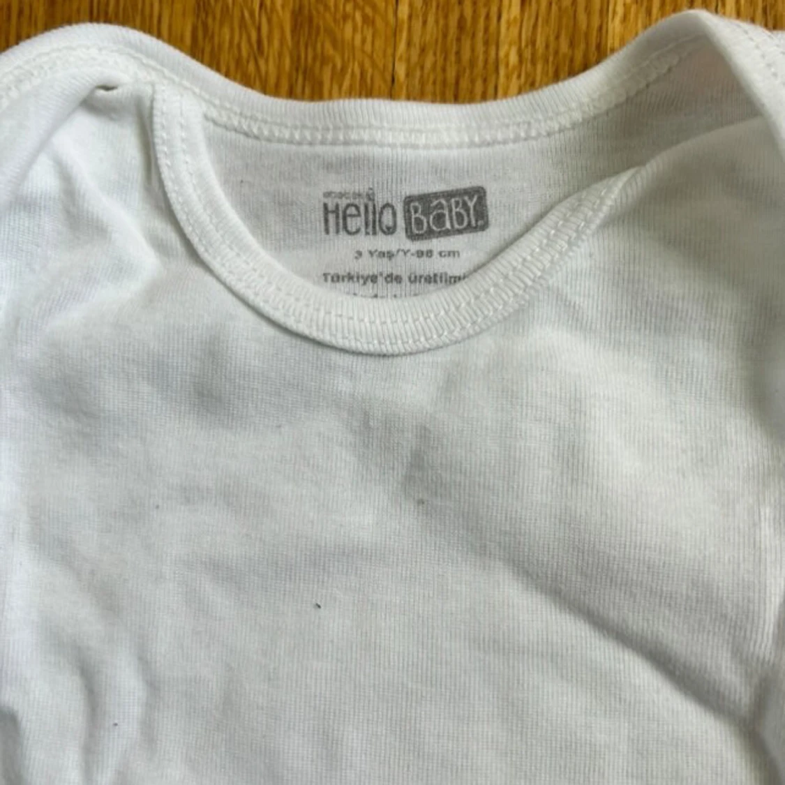 Vit långärmad body från Hello Baby - 1