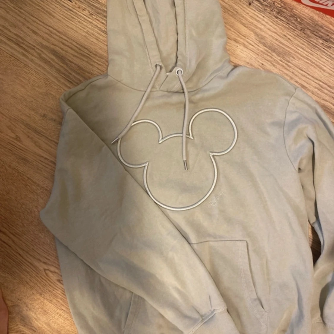 Beige Disney hoodie med Mickey Mouse