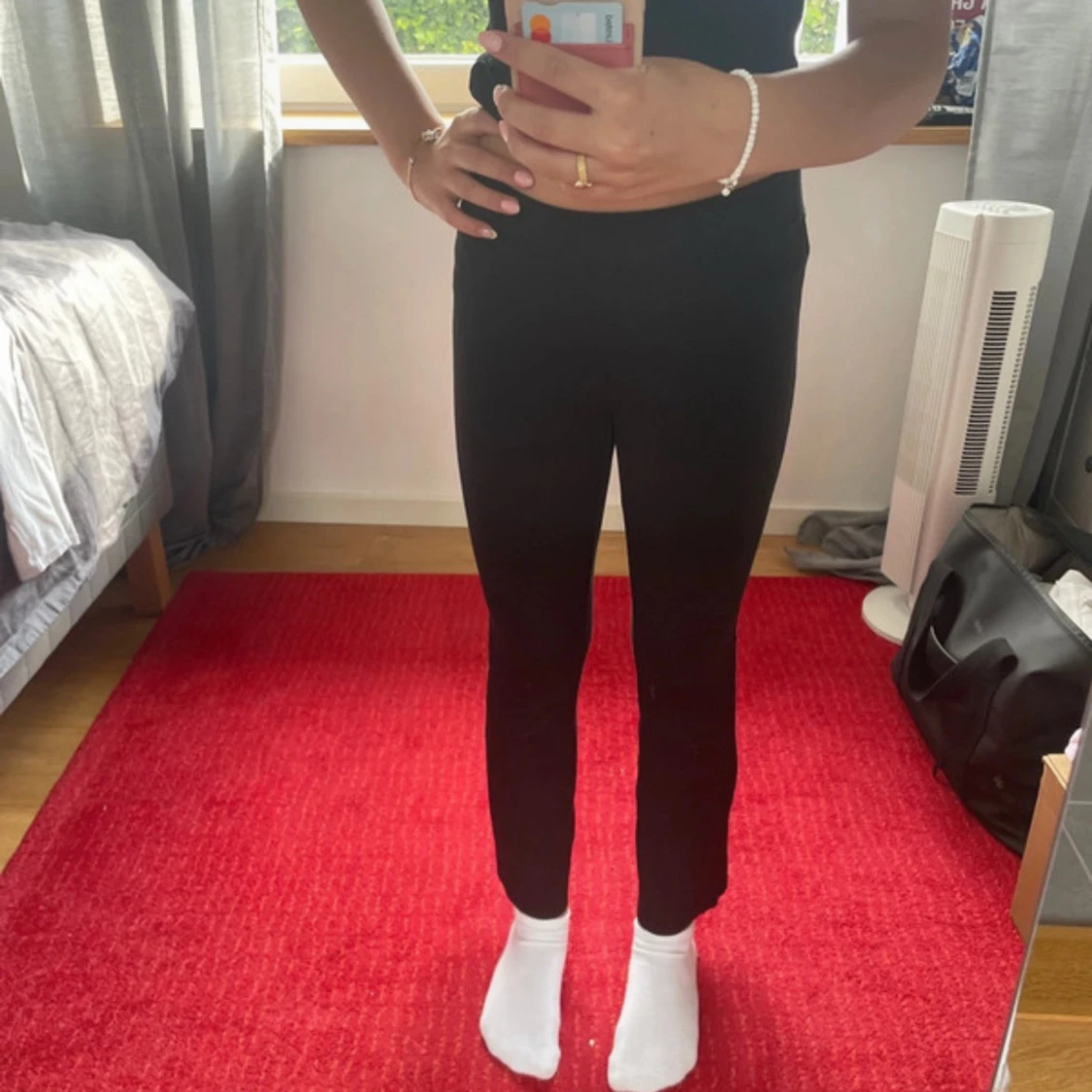 Svarta bootcut byxor i stretch