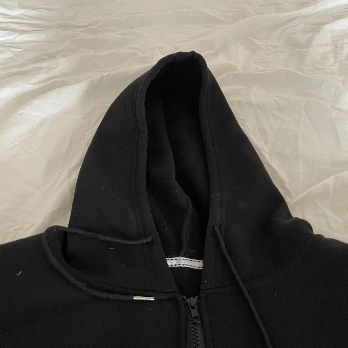 Svart hoodie med tryck 'Eat Sleep Rave Repeat' - 1