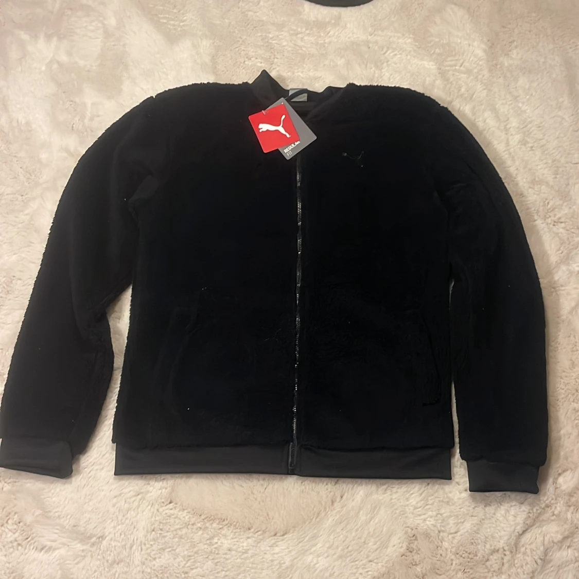 Svart ulltröja från Puma 