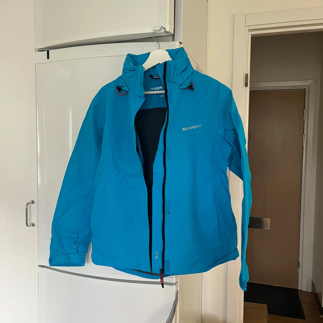Turkos vindjacka från Everest