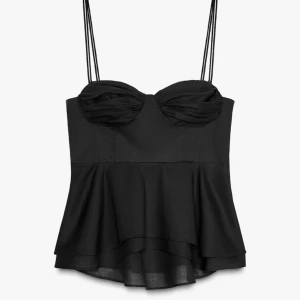 Topp från Zara  - En svart volangtopp från Zara i storlek M