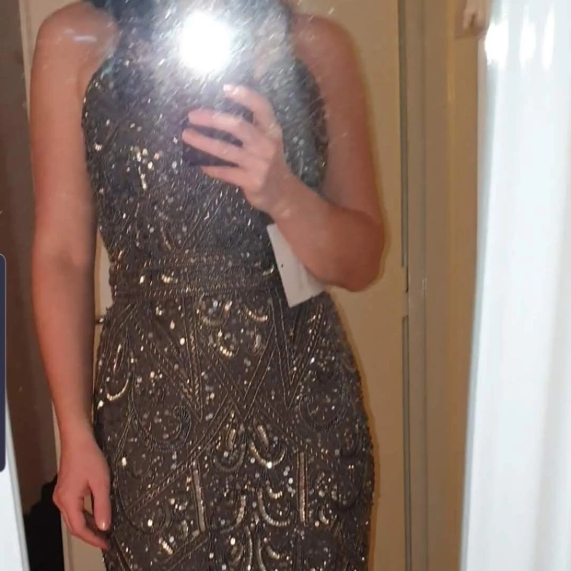 Glittrig långklänning med paljetter