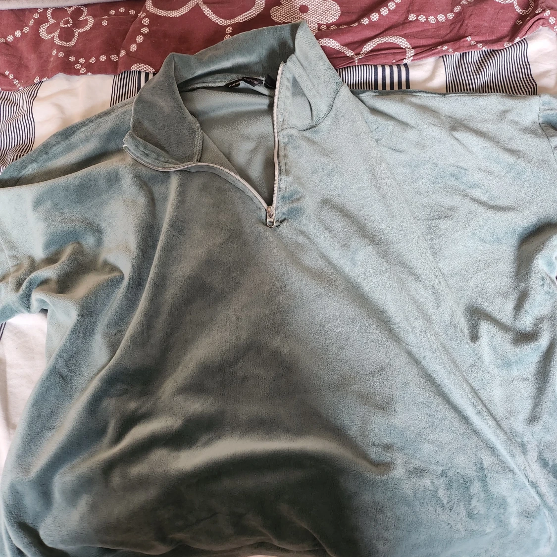 Ljusblå fleece half zip tröja