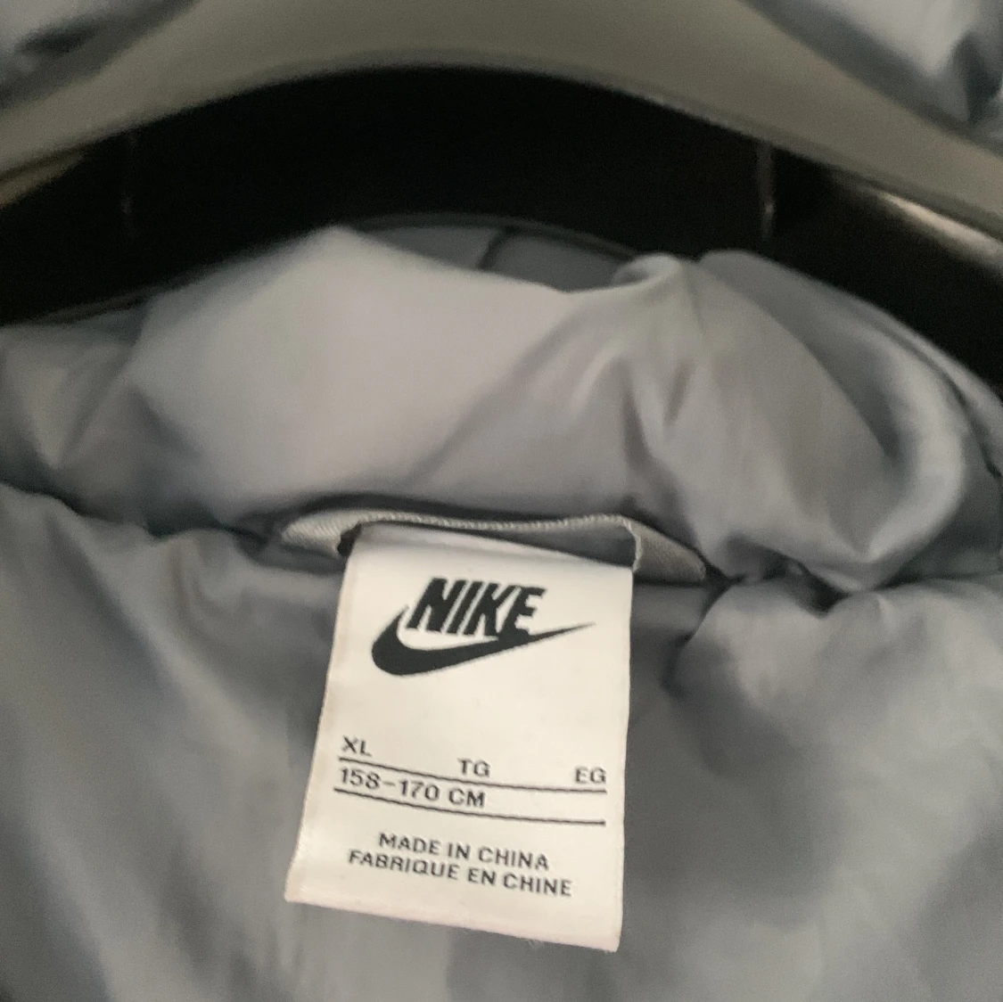 Flerfärgad dunjacka från Nike - 2