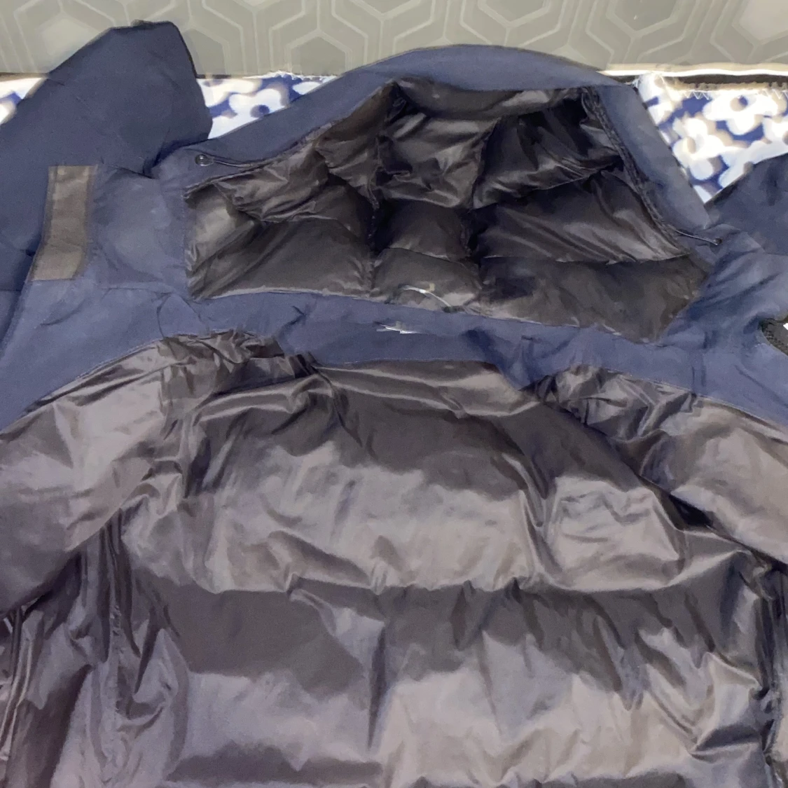 Mörkblå dunjacka från Sail Racing