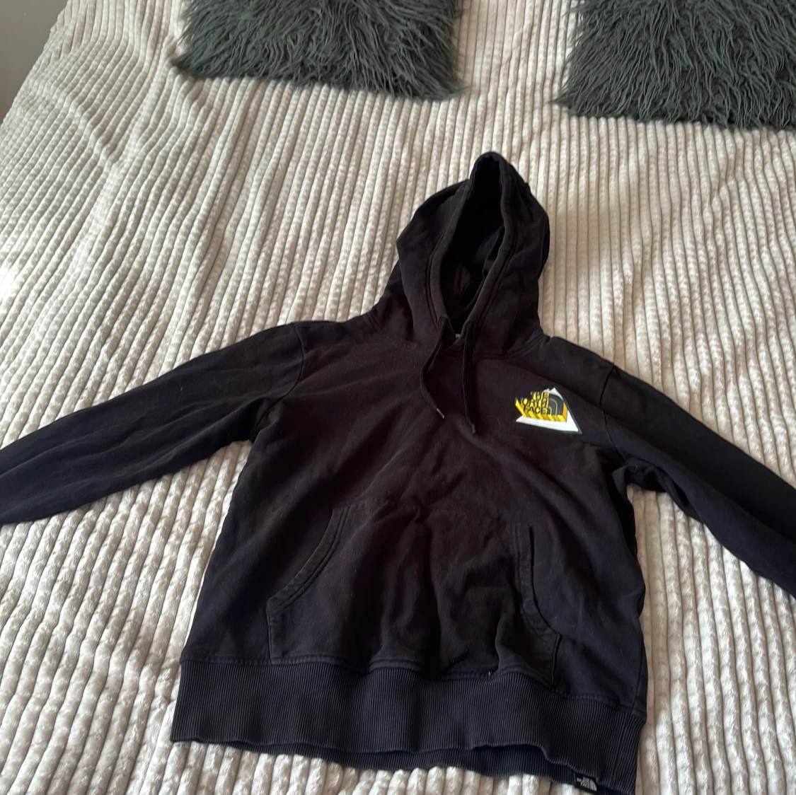 Svart hoodie från The North Face