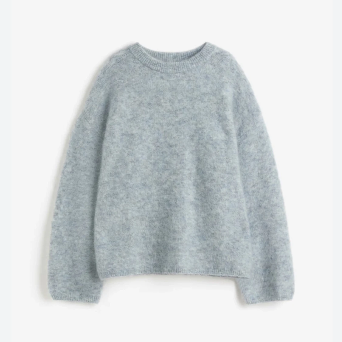 Grå fluffig stickad mohair tröja